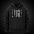 Schwarzer Oversized Hoodie mit distressed BADGER Schriftzug auf der Vorderseite