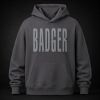 Oversized Hoodie in der Farbe Magnet mit distressed BADGER Schriftzug auf der Vorderseite